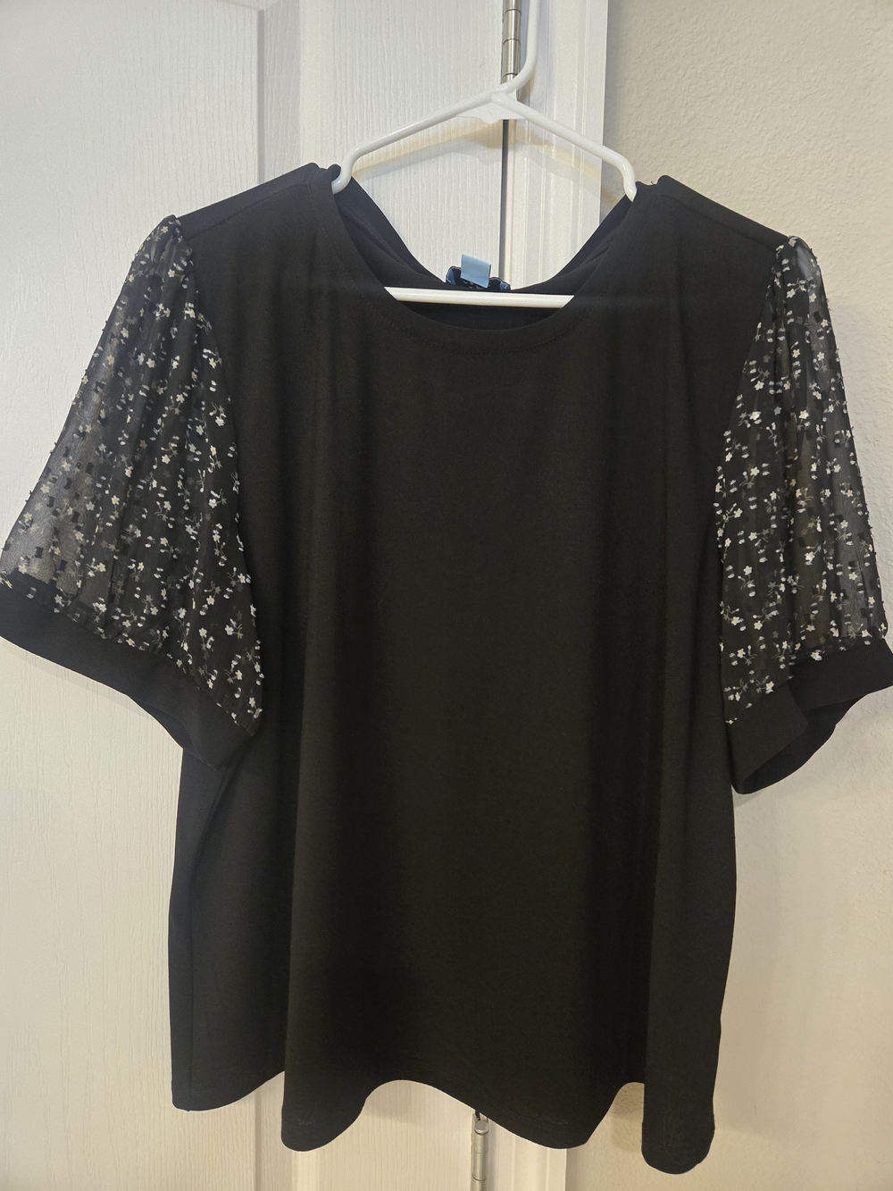 CeCe Black Top with Sheer Floral Sleeves